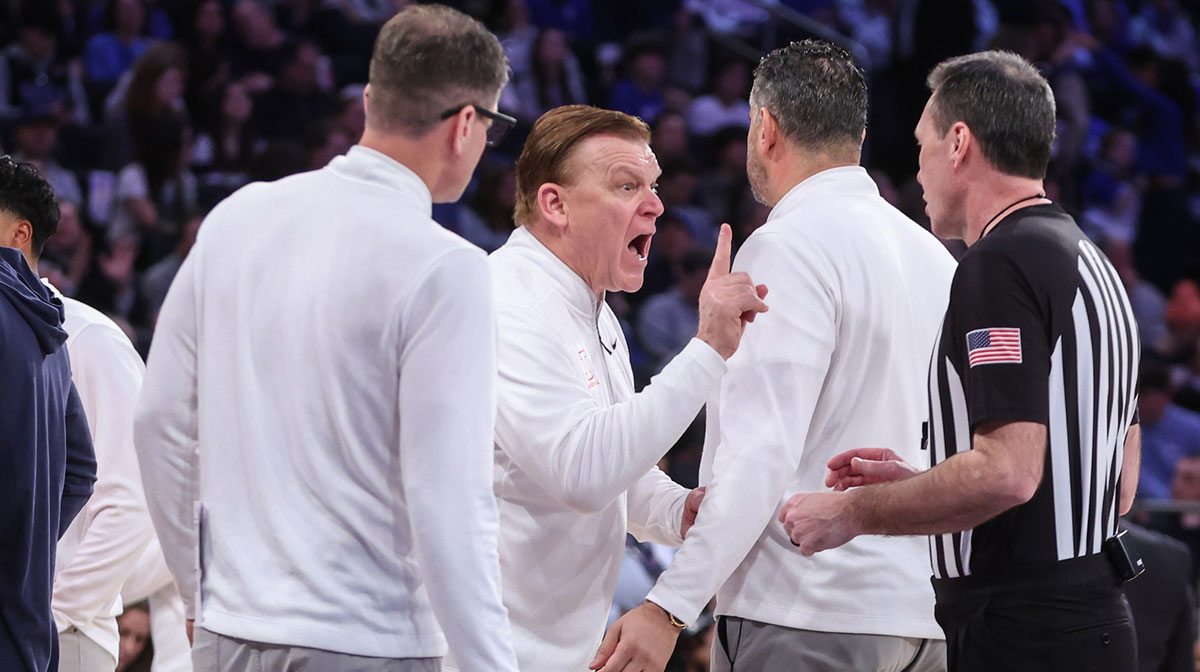 Illinois Fighting Illini head coach Brad Underwood argues with an official in the first half against the Duke Blue Devils at Madison Square Garden.