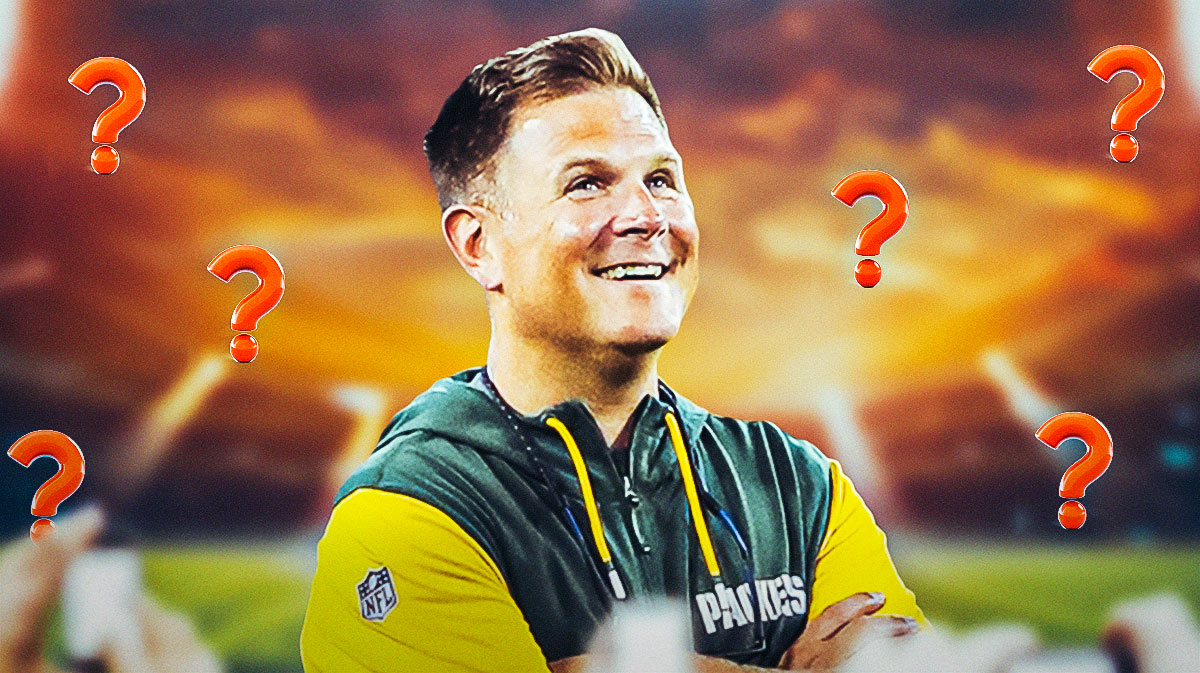 Green Bay Packers general manager Brian Gutekunst next to Sports Illustrated's Bill Huber. They are surrounded by question mark emojis. There is also a logo for the Green Bay Packers.