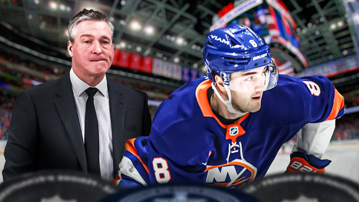 Islanders defenseman Noah Dobson on the right, Patrick Roy on the left, inside UBS Arena