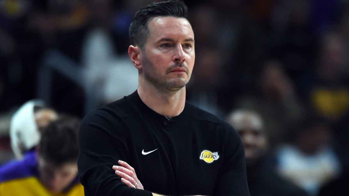 Los Angeles Lakers head coach JJ Redick looks on from the sideline during the second half against the Denver Nuggets at Ball Arena.