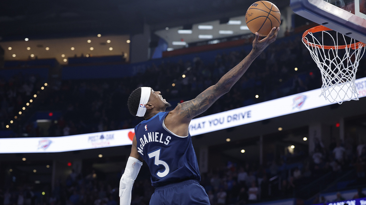 Minnesota Timberwolves forward Jaden McDaniels (3) shoots against the Oklahoma City Thunder during the second half at Paycom Center.