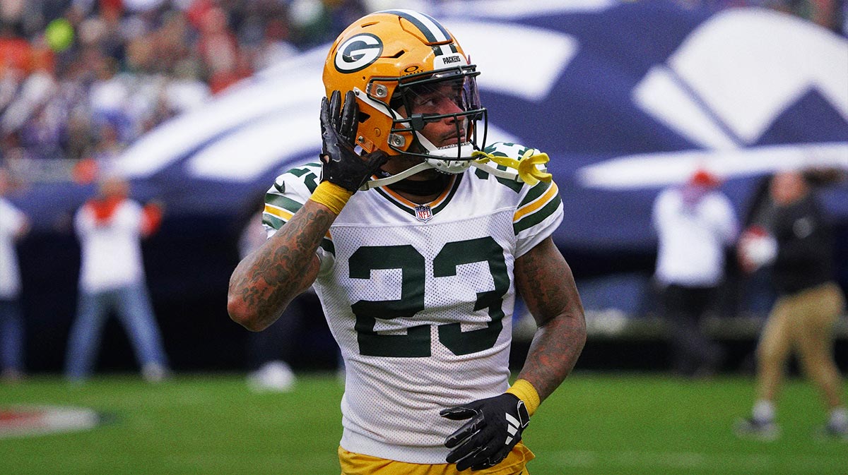 Green Bay Packers cornerback Jaire Alexander (23) gestures to the fans before the game against the Chicago Bears at Soldier Field.