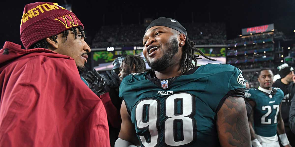 26. January 2025. years; Philadelphia, PA, USA; Washington commanders Quarterback Jaiden Daniels (5) and Philadelphia Eagles defensively adhere to the Jalen Carter (98) after the NFC Championships on the Lincoln's financial field. Required Credit Image: Eric Hartline-IMSN Pictures