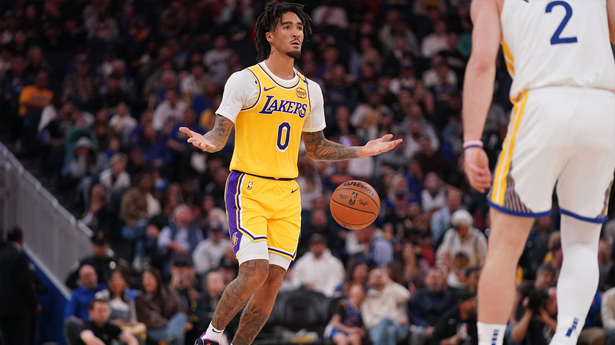 Los Angeles Lakers Guard Jalen Hood-Schifino (0) Dribblible Ball in court against golden state warriors in the first quarter in Chese Center.