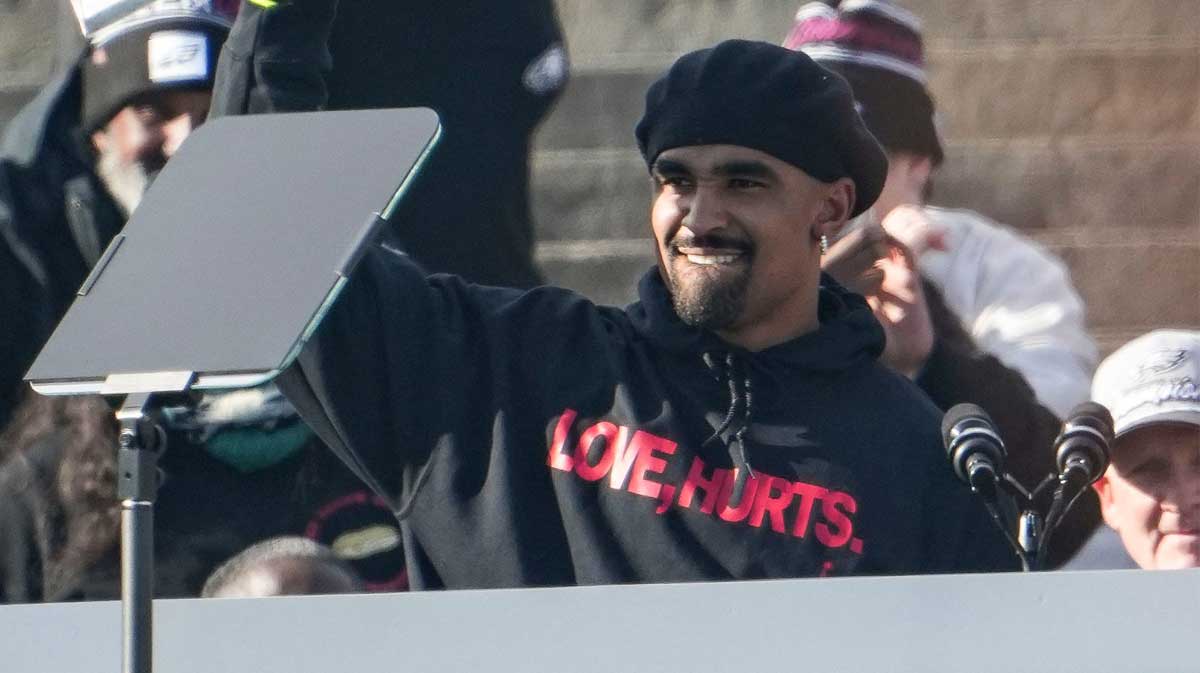 Jalen Hurts holding the Lombardi Trophy during the Super Bowl 59 parade on February 14, 2025.