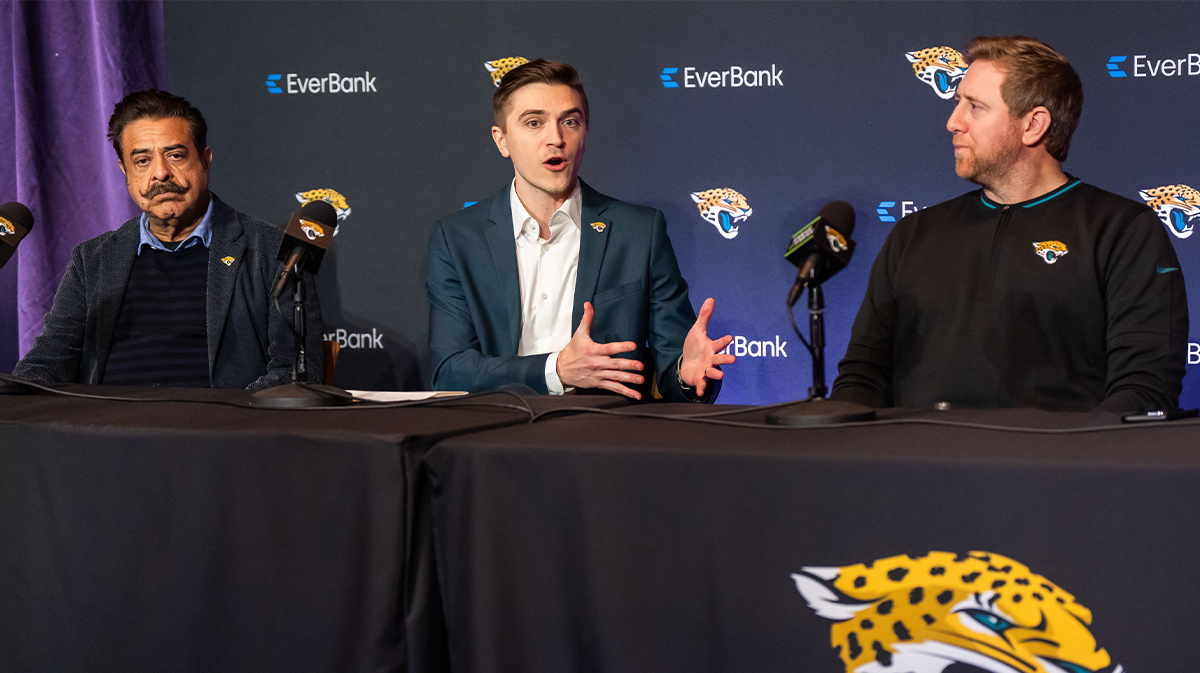 Jacksonville Jaguars Owner Shad Khan, left, listens as Jacksonville Jaguars General Manager James Gladstone, center, explained what he was bringing to the table during a press conference Monday morning February 24, 2025 at the Miller Electric Center in Jacksonville, Fla. as Head Coach Liam Coen, right, listened.