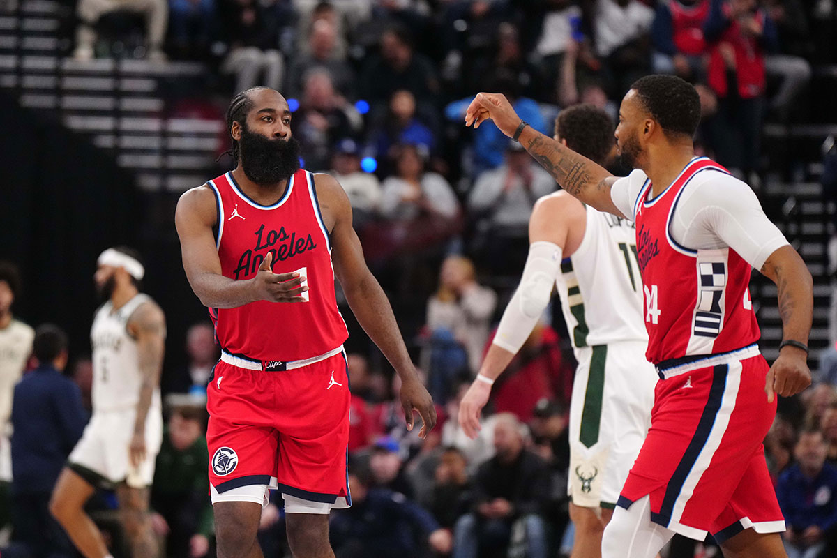 La Clippers Guard James Harden (1) and preserves Norman Powell (24) celebrates in the second half against Milwaukee's dollars at Intuit Dome.