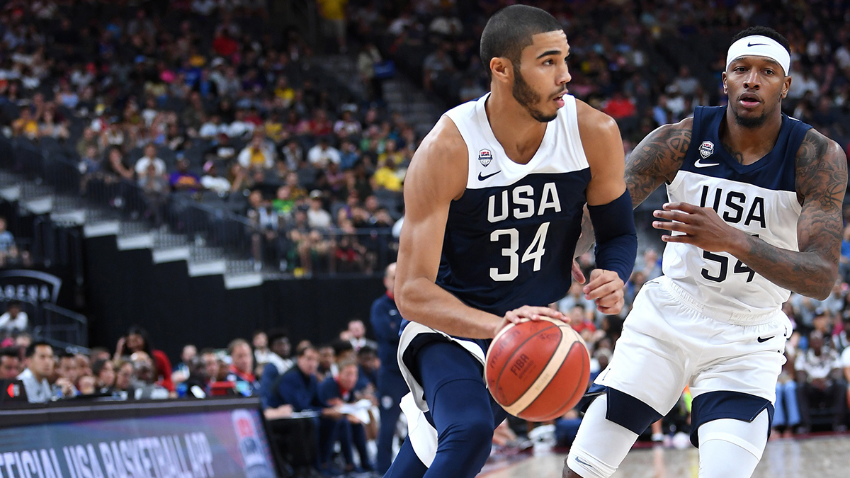 National Blue Team of the United States forward Jaison Tatum (34) Dribbles from USA Male White Team forward Tori Craig (54) During the second half of the American basketball game in a basketball game in T-Mobile Arena