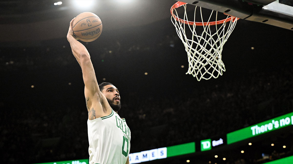 Boston Celtics Forward Jaison Tatum (0) Dunks and results against San Antonio Spurs during the first quarter in the TD garden.