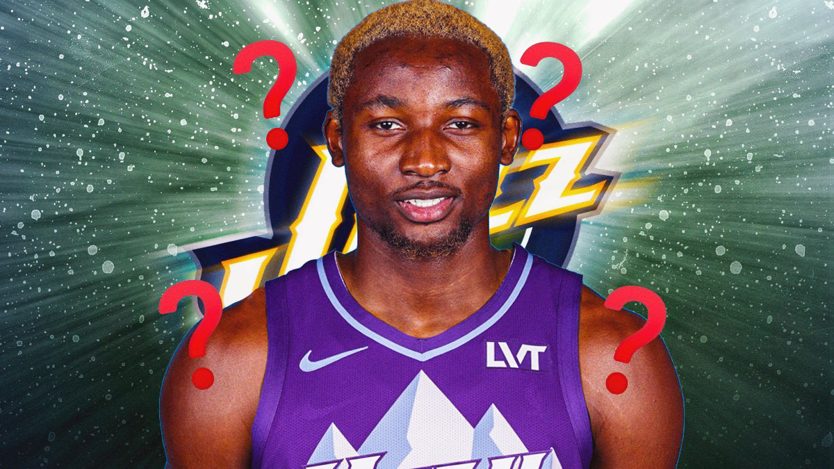 Jonathan Kuminga in the middle in a Utah Jazz uniform, Utah Jazz wallpaper in the background, 🤩 emoji all around