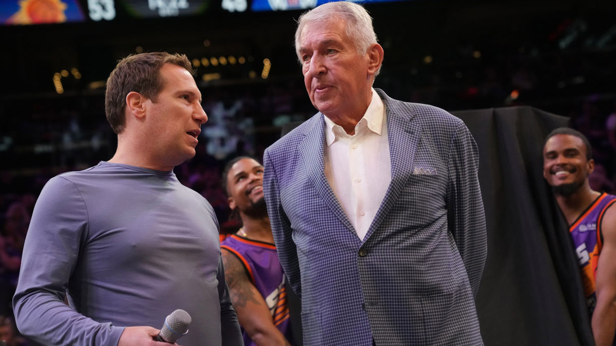 Suns owner Mat Ishbia and former owner Jerry Colangelo interact before Broadcaster Al McCoy is honored for 51 seasons as "Voice of the Suns" during halftime against the Los Angeles Clippers on April 9, 2023, at Footprint Center in Phoenix. Mat Ishbia and Jerry Colangelo interact during halftime.