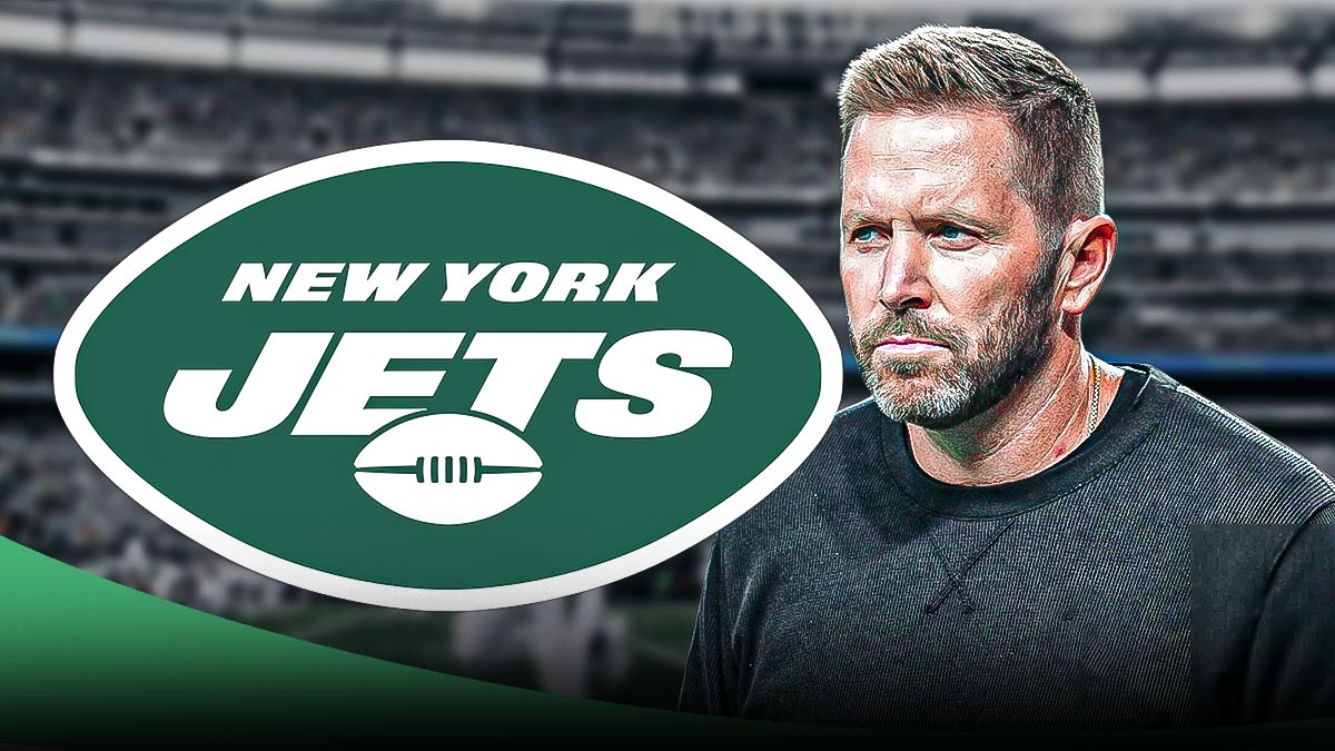 Coach Scott Turner next to a New York Jets logo