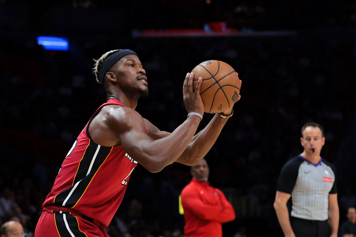 Miami heat forward Jimmy Butler (22) shoots at basketball against Blazers Portland Trail Blazer during the first quarter in Kashi Center.