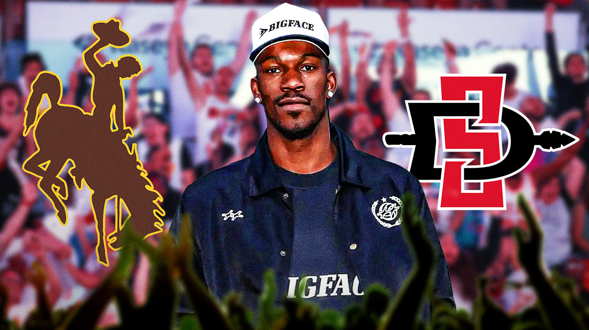 Heat Jimmy Butler (front) with Wyoming Cowboys logo and San Diego State Aztecs logo behind him