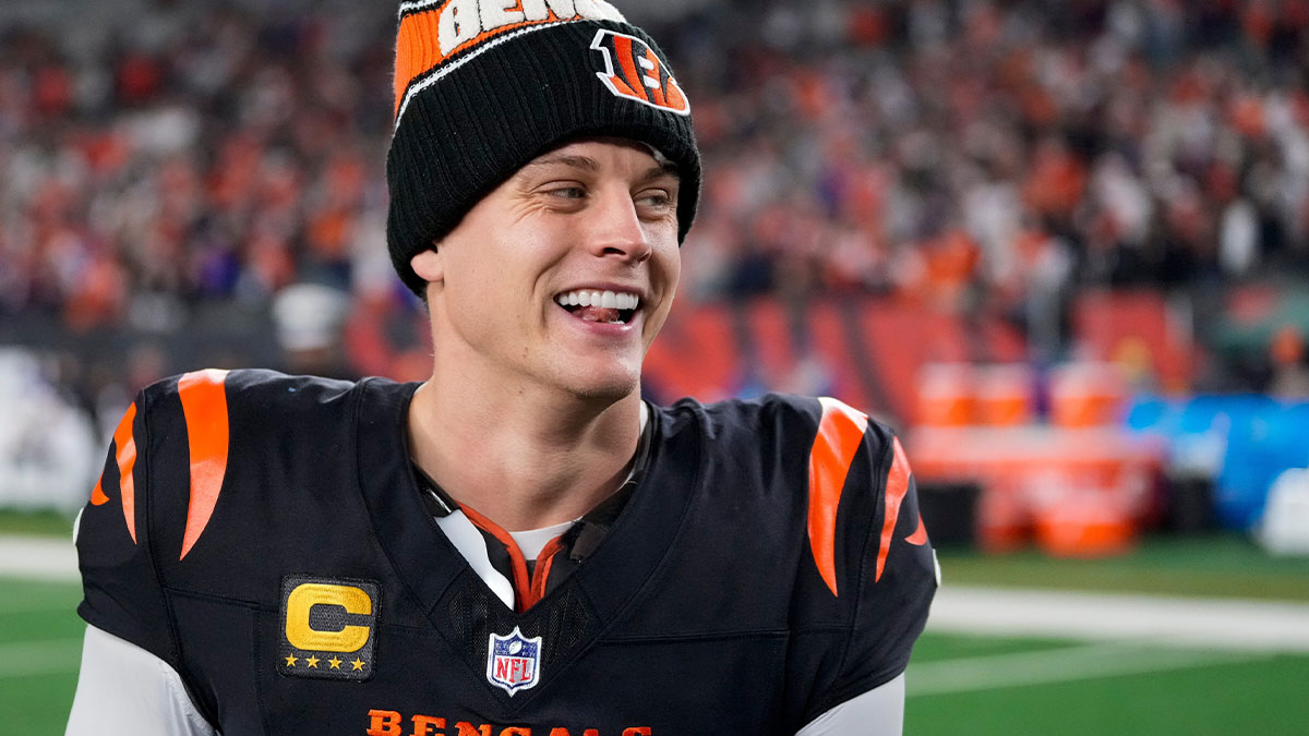 Bengals quarterback Joe Burrow celebrates a Week 17 overtime win over the Denver Broncos that kept Cincinnati's slim playoff hopes alive. Burrow threw for 412 yards and three touchdowns in the game and also added a rushing score.