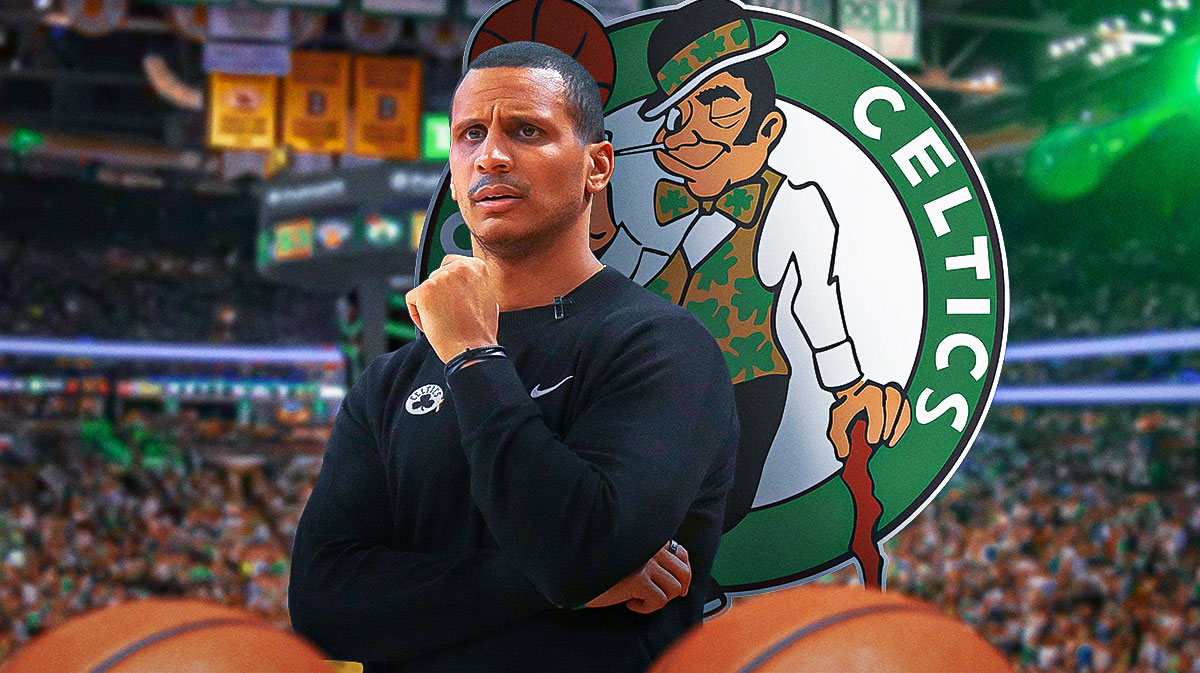 Celtics head coach Joe Mazzulla next to the Celtics logo with TD Garden in the background