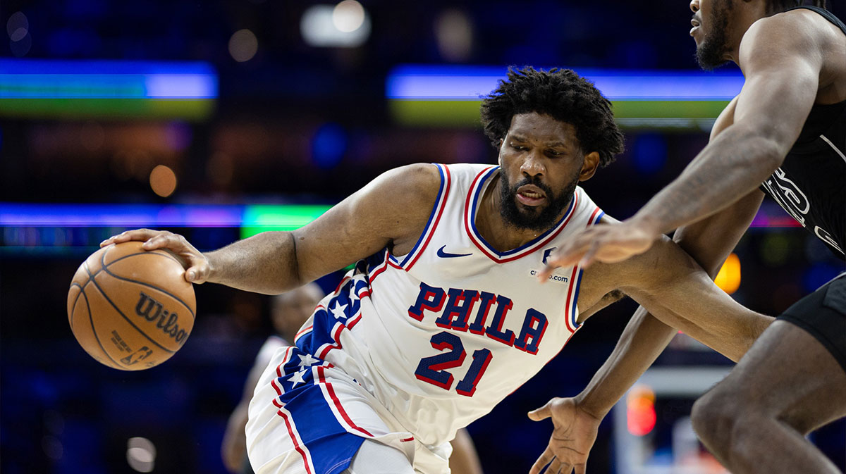 Philadelphia 76ers center Joel Embiid (21) controls the ball against Brooklyn Nets center Day'Ron Sharpe (20) during the third quarter at Wells Fargo Center.