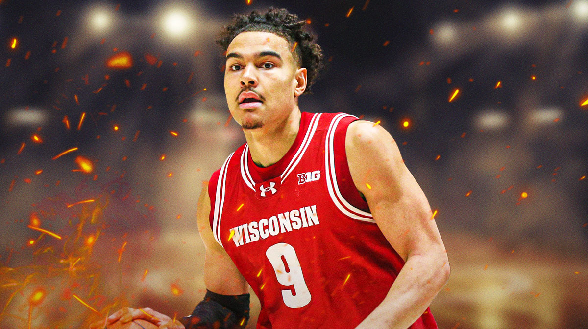 Photo: John Tonje in Wisconsin basketball jersey with fire around him