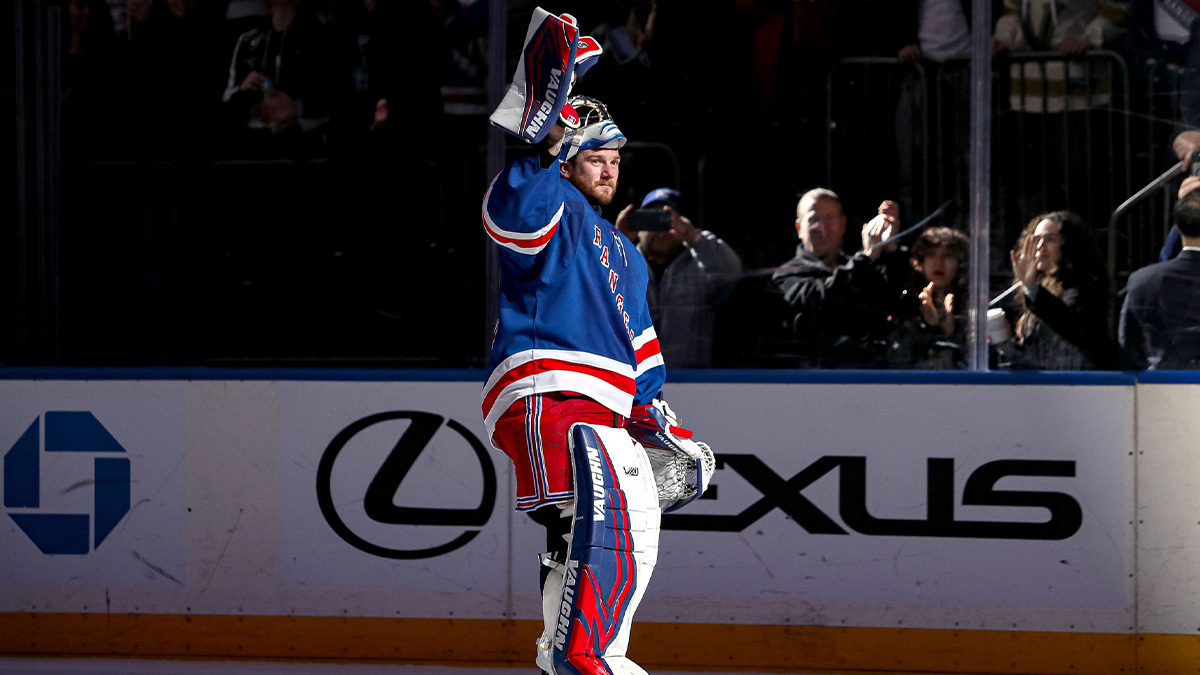 New York Rangers goalie Jonathan Quick (32) celebrates after his 400th career win following a 4-2 victory against the Vegas Golden Knights at Madison Square Garden.