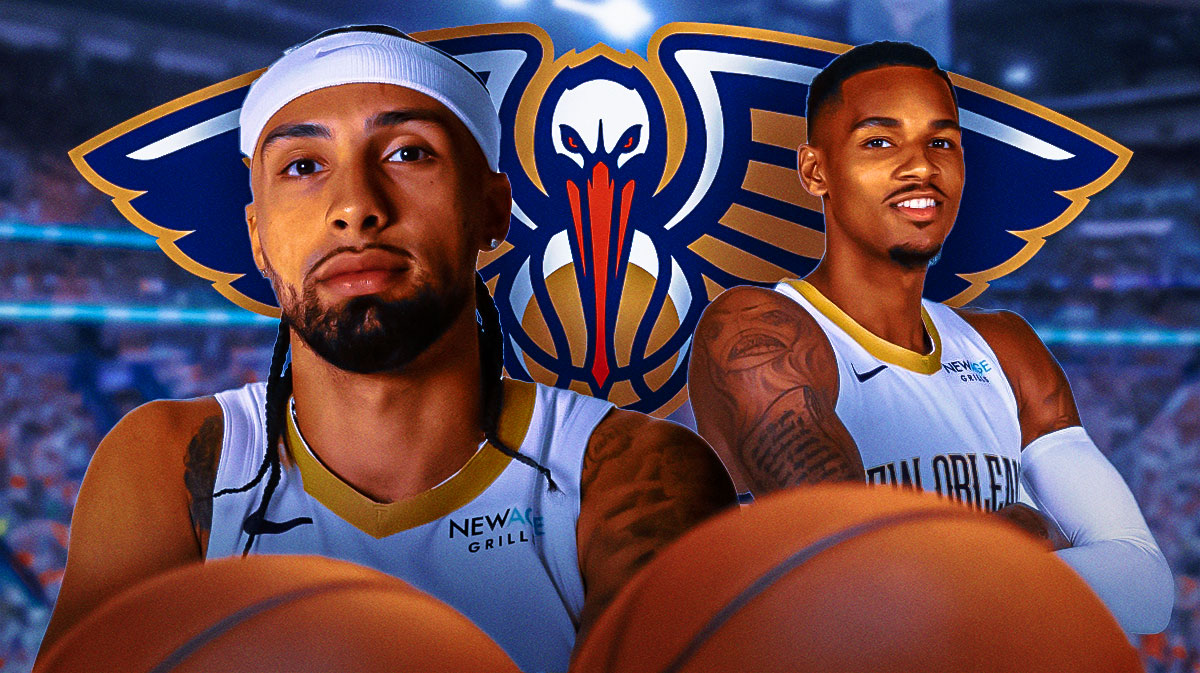 Pelicans guard Jose Alvarado next to Pelicans guard Dejounte Murray with the Pelicans logo in the background