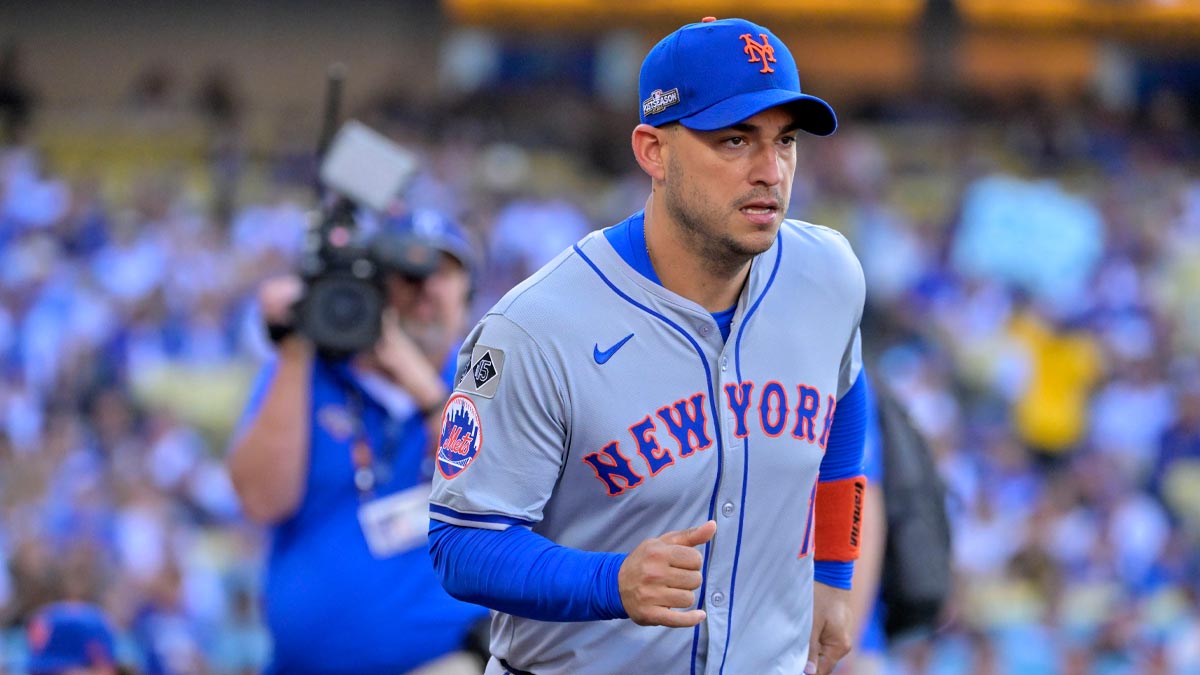 New York Mets second base Jose Iglesias (11) takes the field before game one of the NLCS for the 2024 MLB Playoffs at Dodger Stadium.