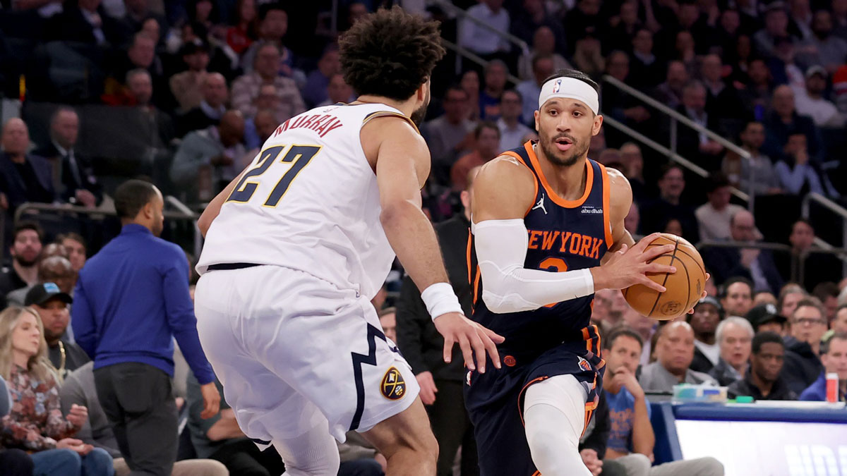 New York Knicks Guard Josh Hart (3) Drive to Cart against Denver Nuggets Guard Jamal Murrai (27) during the first quarter in Madison Square Garden.