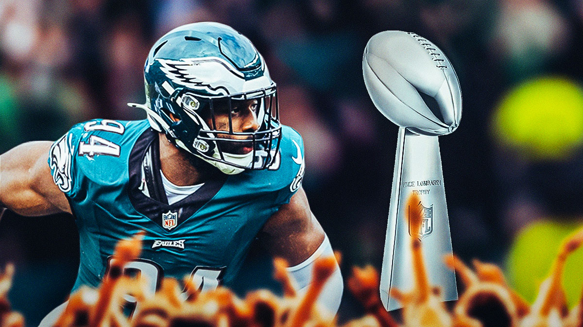 Josh Sweat in a Philadelphia Eagles uniform with the Lombardi Trophy after win over Chiefs.