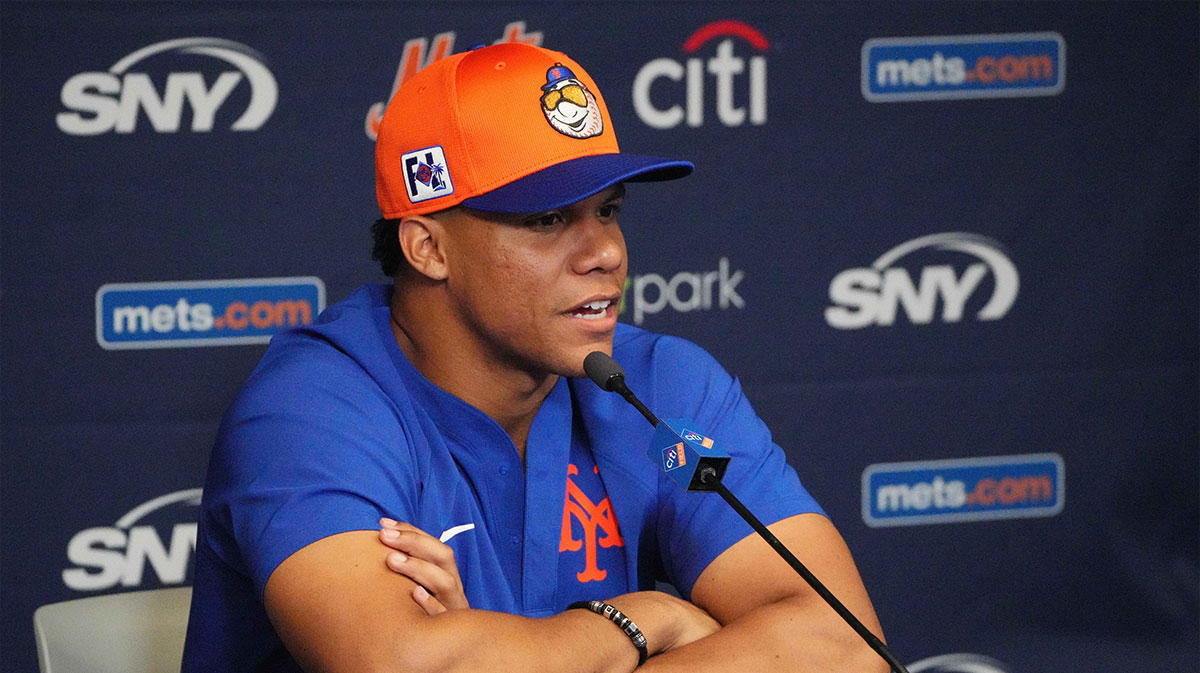 New York Mets outfielder Juan Soto (22) addresses the media at spring training.