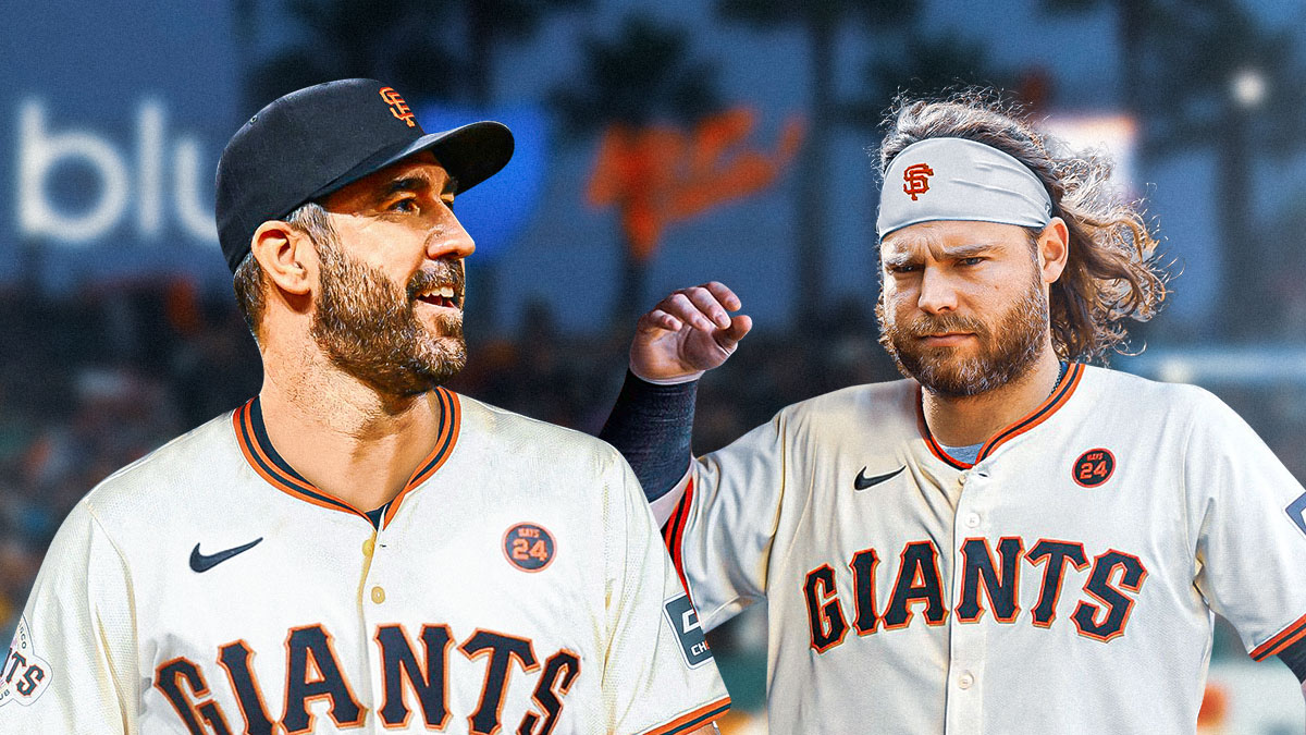 Justin Verlander (in a Giants uniform) standing next to Brandon Crawford (also in a Giants uniform) with a thumbs up