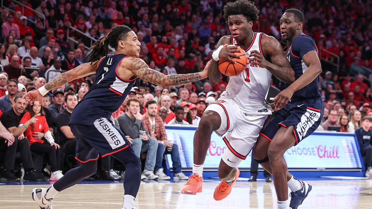 St. John's Red Storm guard Kadary Richmond (1) drives past Connecticut Huskies guard Solo Ball (1) in the second half at Madison Square Garden.