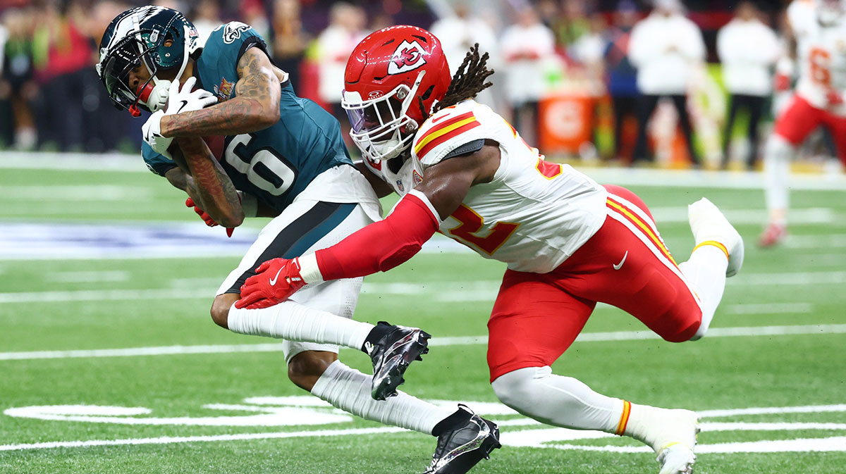 Philadelphia Eagles wide receiver DeVonta Smith (6) makes a catch against Kansas City Chiefs linebacker Nick Bolton (32) in the first quarter in Super Bowl LIX at Ceasars Superdome.