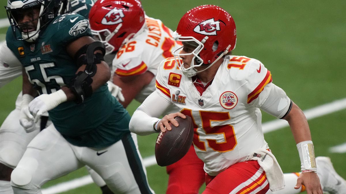 Kansas City Chiefs quarterback Patrick Mahomes (15) rushes the ball against the Philadelphia Eagles during the fourth quarter in Super Bowl LIX at Caesars Superdome.