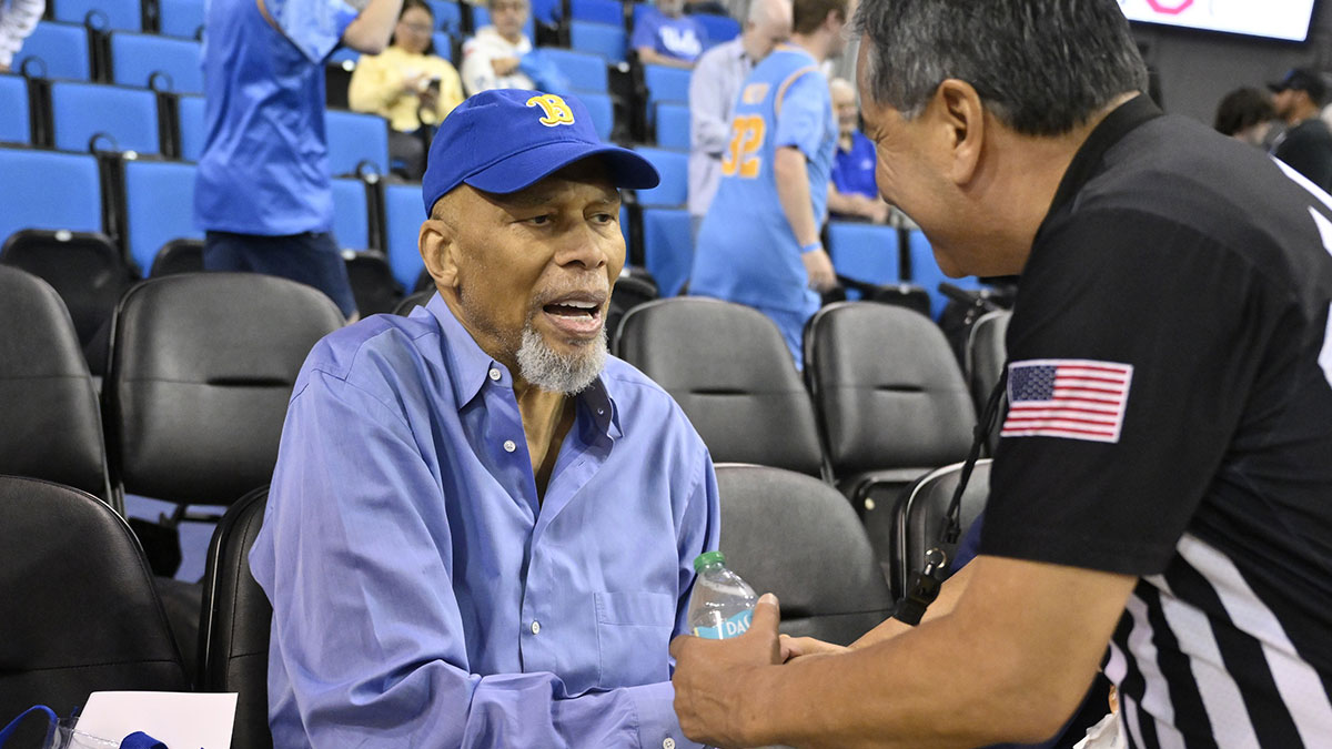 Former UCLA and NBA player Kareem Abdul-Jabbar shakes hands with an official before the UCLA Bruins play the Ohio State Buckeyes at Pauley Pavilion presented by Wescom. 