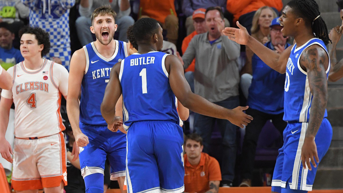 Kentucky forward Andrew Carr (7) and Kentucky forward Brandon Garrison (10) react when Kentucky guard Lamont Butler (1) made a shot near Clemson senior forward Ian Schieffelin (4) during the first half at Littlejohn Coliseum. 