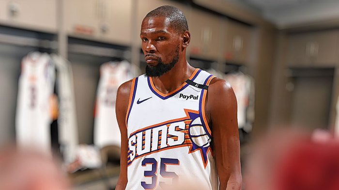 Kevin Durant looking frustrated and a background of the Suns locker room