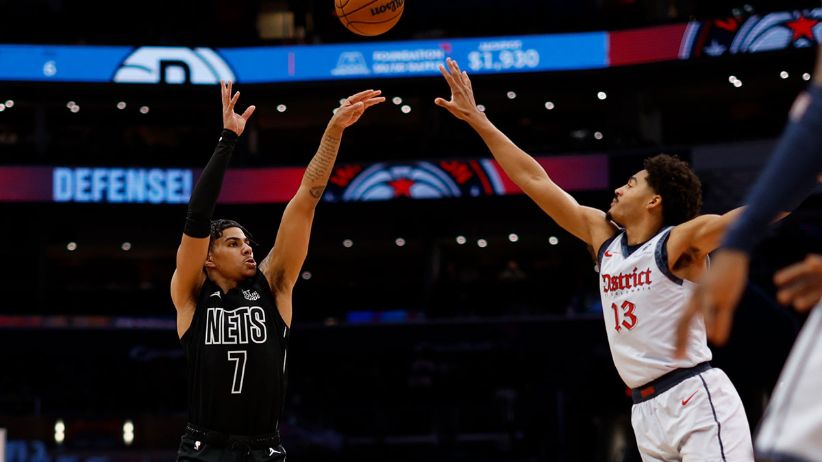 Brooklyn Nets guard Killian Hayes (7) shoots the ball over Washington Wizards guard Jordan Poole (13) in the first half at Capital One Arena.