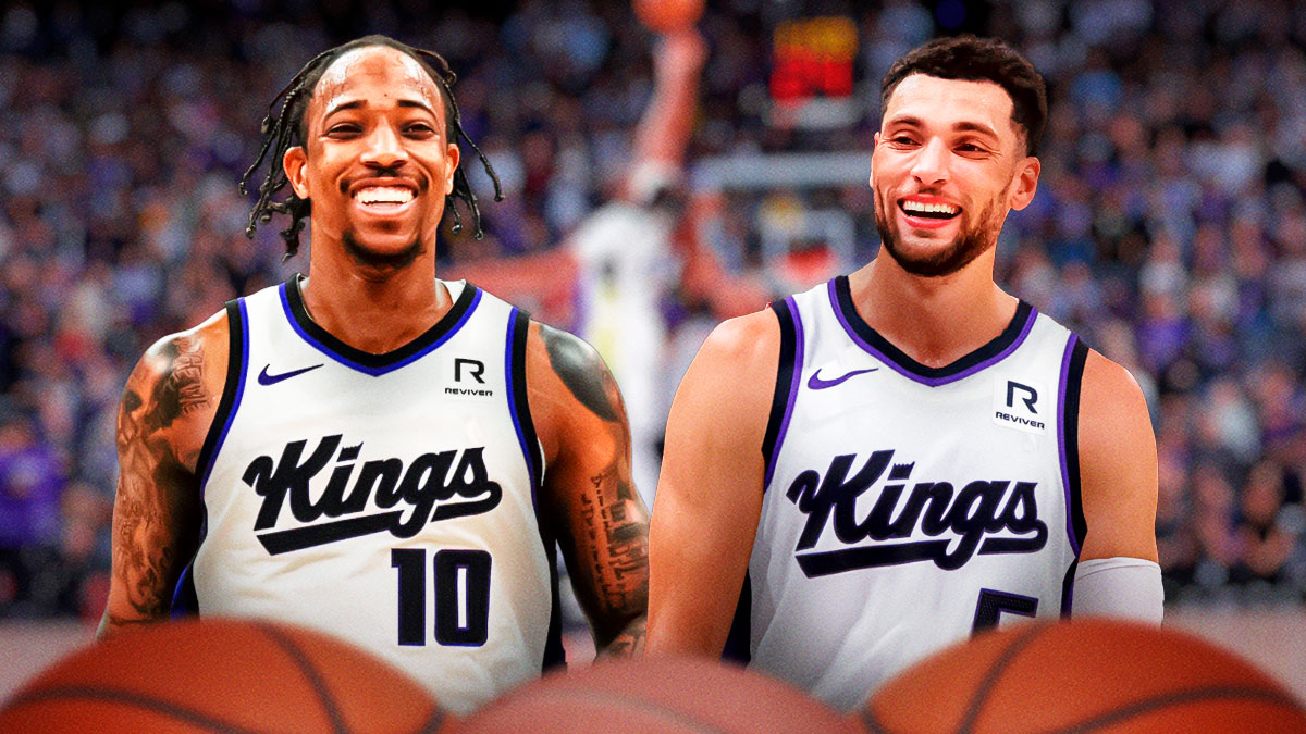 Kings guard DeMar DeRozan shaking hands with Zach LaVine, who's also in a Kings jersey and a background of the Golden 1 Center behind both players