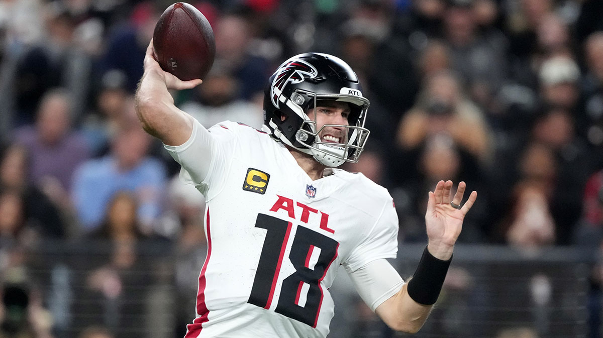 Atlanta Falcons quarterback Kirk Cousins (18) throws the ball against the Las Vegas Raiders in the first half at Allegiant Stadium.