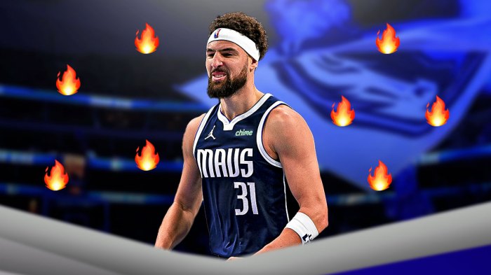 Image of Mavs Klay Thompson looked hyped and happy with fire emojis all around him and fire in his eyes