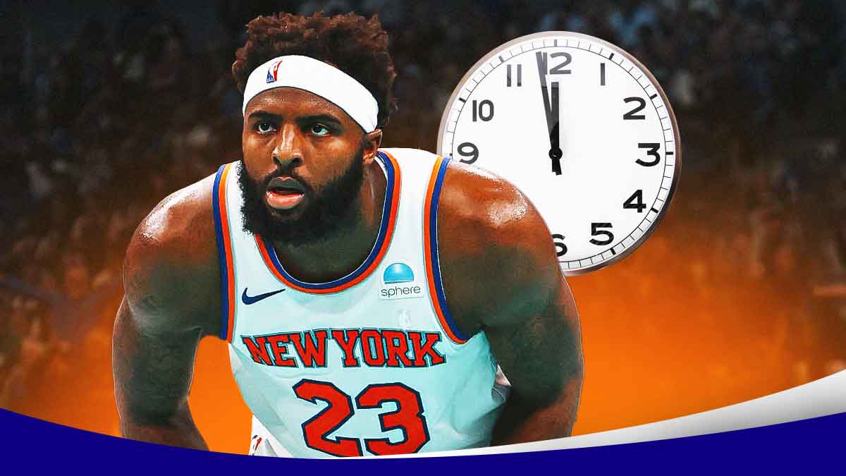 Photo: Mitchell Robinson in Knicks jersey with a clock beside him, MSG as background