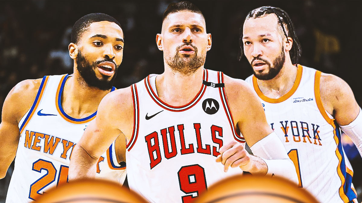 Knicks All-Star Jalen Brunson next to Knicks forward Mikal Bridges with Bulls' Nikola Vucevic in between the two