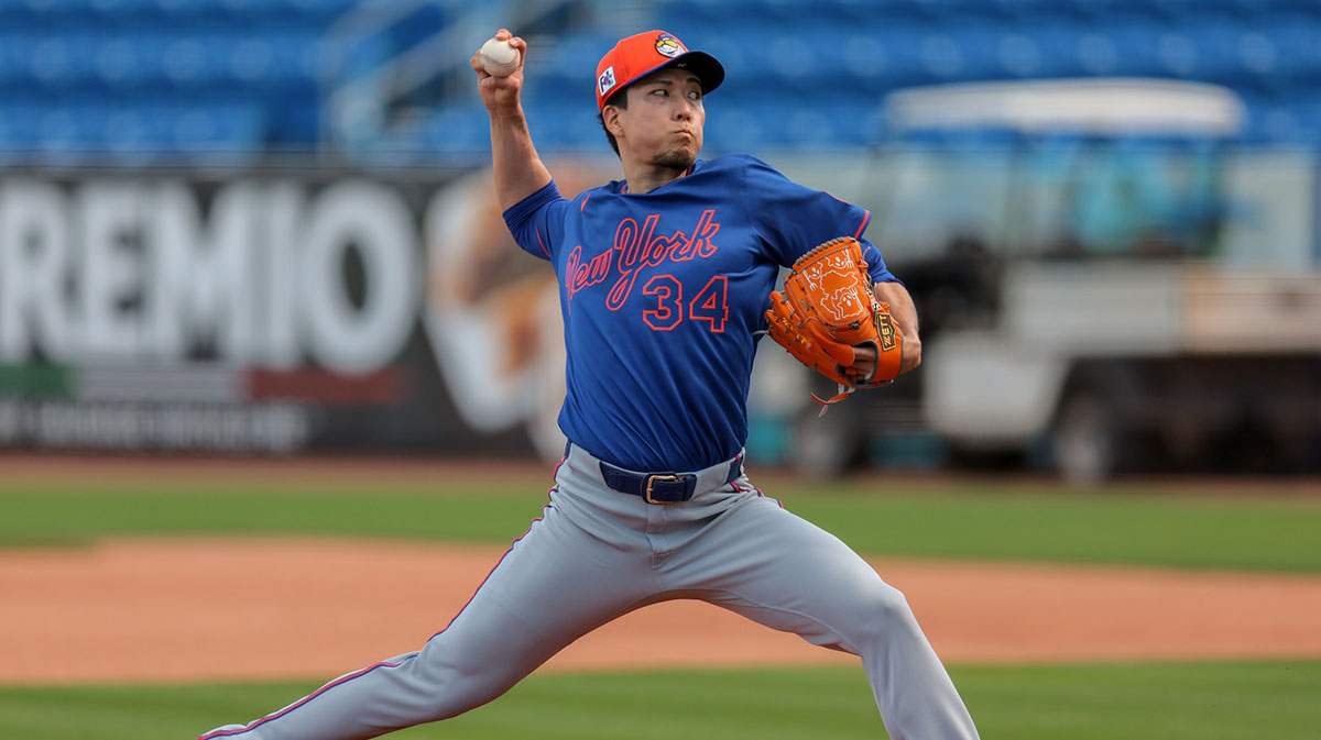 New York Mets pitcher Kodai Senga (34) pitches during a spring training workout at Clover Park.