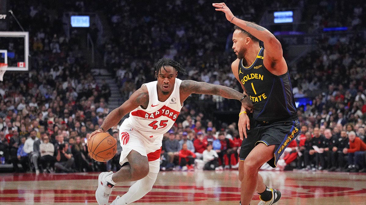 Toronto Raptors Guard Davion Mitchell (45) Drives on the network against the golden state warriors forward Kale Anderson (1) during the first half in Scotiabank Arena.