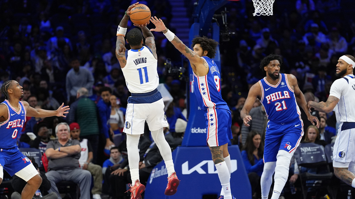 Dallas Mavericks Guard Kirie Irving (11) Shooting the ball against Philadelphia 76ers Kelly OuBre Jr (9) in the third quarter of the Vells Fargo Center. 