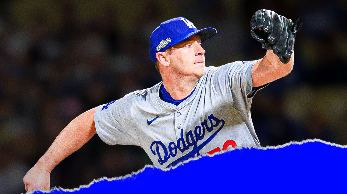Dodgers Evan Phillips pitching a baseball at Dodger Stadium.