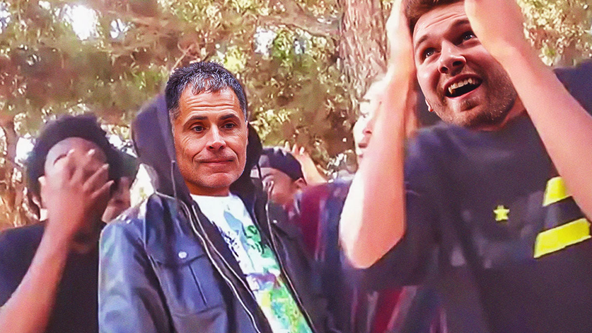 Rob Pelinka (Lakers GM) as the guy in the hoodie and Luka Doncic as the guy on the right with hands on head.