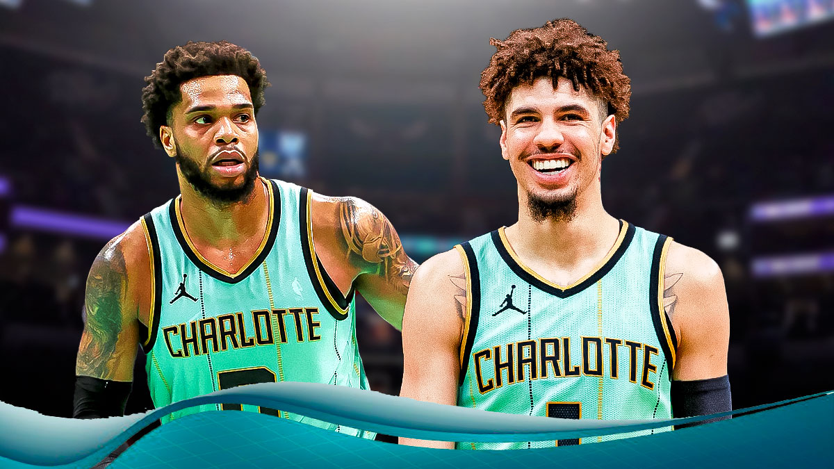 LaMelo Ball next to Miles Bridges on the Hornets court.