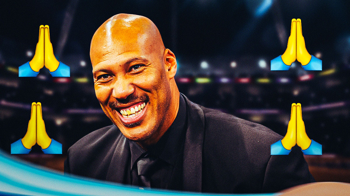 LaVar Ball with prayer hands around the picture.