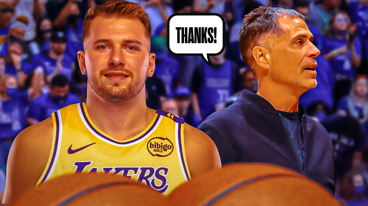 Photo: Rob Pelinka smiling beside Luka Doncic in Mavericks jersey, have Pelinka saying "Thanks!", have angry Mavericks fans in background