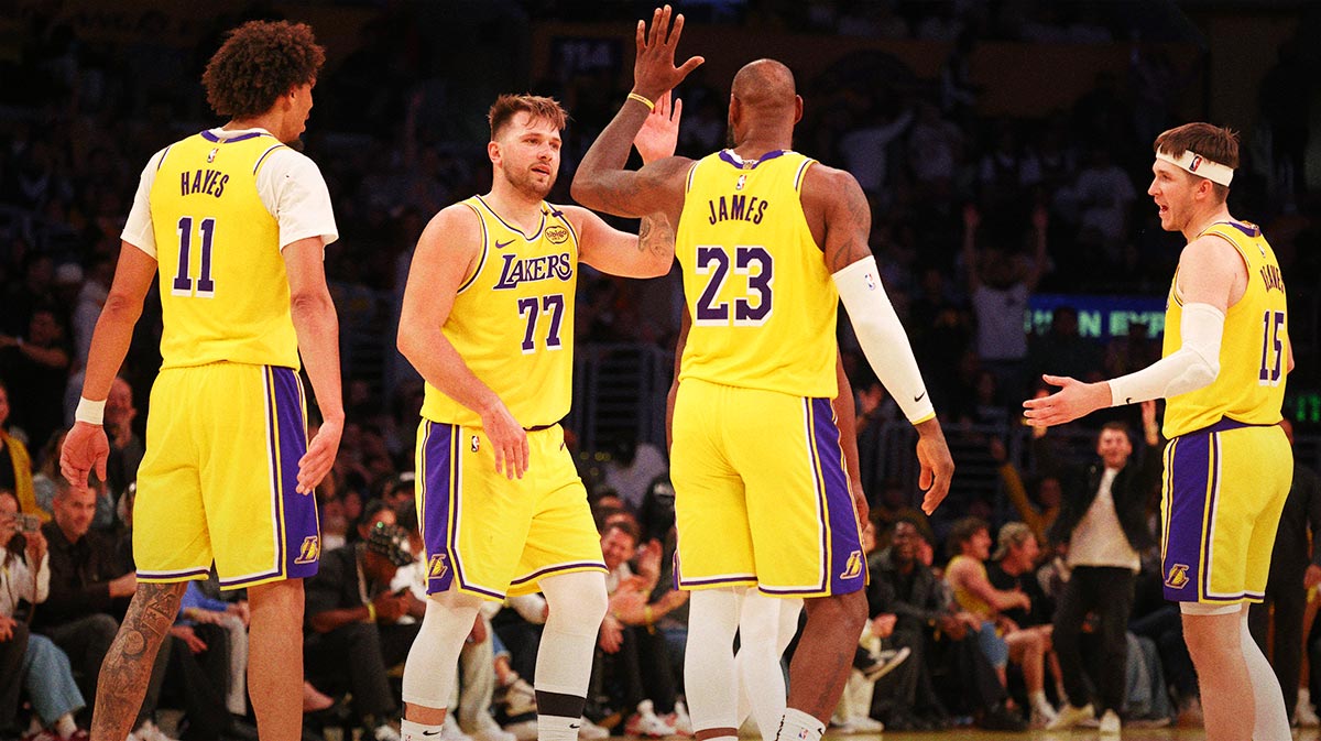 Lakers Guard Luka Dončić (77) is celebrated with advanced Lebron James (23) after making a basket during the fourth quarter against Minnesota Timbervolves on Cripto.com Arena